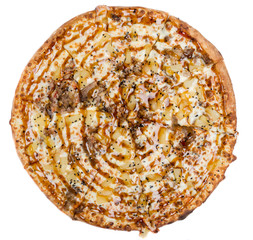 Top view of a full chicken pizza with teriyaki sauce and pineapple isolated on white.