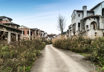 The dilapidated villas are in the outskirts