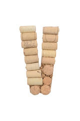 Alphabet letter V from wine corks isolated on white background