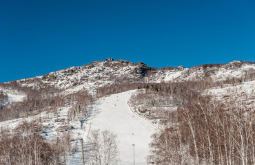 Magnitogorsk, Russia - February 23.2018: Mountains and winter landscape of the Southern Urals and Bashkiria Lake Yakty-Kul. Ski resort "Bannoye",   Russia