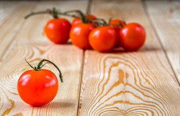 Cherry tomatoes on a light table.