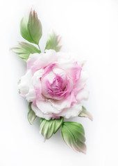 Realistic Fabric Silk flower in pink and white colors rose hand made on white background. Vintage style, retro, card