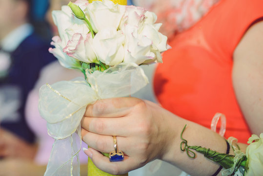 Bridesmaid Holding Flowers