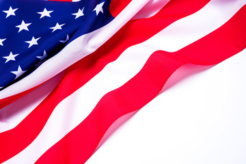 Closeup of American flag on white background.
