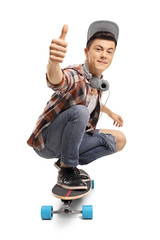 Teenager with a longboard making a thumb up sign