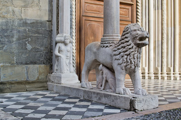 Sculpture of stone lion, part of the column of the European Church, European art, entrance to the Cathedral