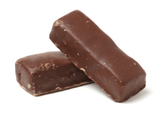 Chocolate peanut candy on white background