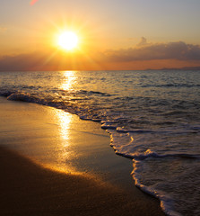 Panele Szklane Podświetlane  Beautiful sunrise on the Greek beach.