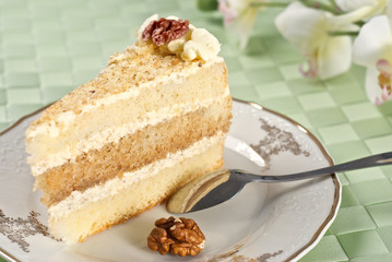 Walnut cake on the plate
