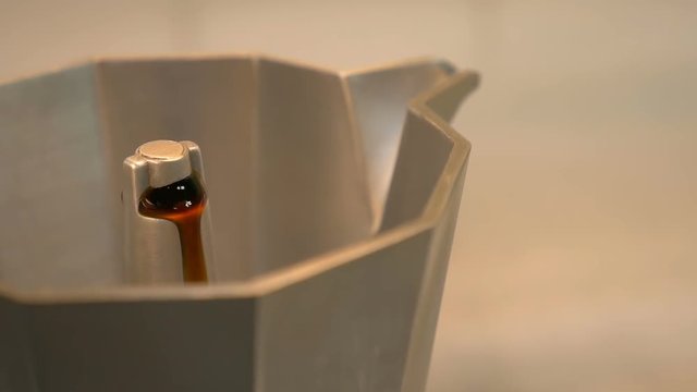 Coffee percolator machine close up, making italian coffee