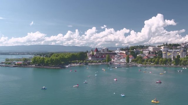 Lausanne Ouchy aerial drone shot. Lake Geneva on a beautiful sunny day - discovering the IOC capital