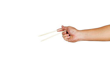Hands are shown using chopsticks.On the white background.