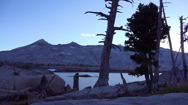 The sun rises in timelapse in the Desolation Wilderness of the Sierra Nevada mountains.