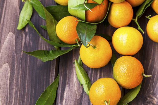 Clementines citrus fruits heap top view