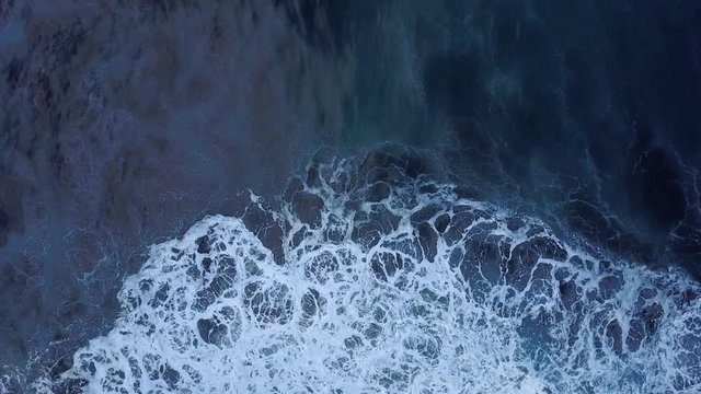 4K amazing nature ocean surf drone shot. Perfect waves seen from above - aerial cinematic shot