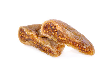 half cut dried figs on white background