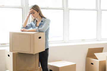 A woman with box at home