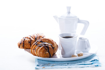 Croissant with Chocolate Espresso and milk Milk Tradition Morning Baking Sweet Dessert on the White Background Copy space for Text