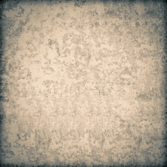 Vintage brown grunge background. The texture of the old surface. Abstract pattern of cracks, scuffs, dust