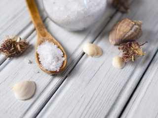 bath salt on white wood table
