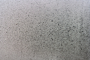 Texture of water drops. Water vapor on the glass background