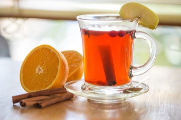 Drink with Apple and Cinnamon Stick