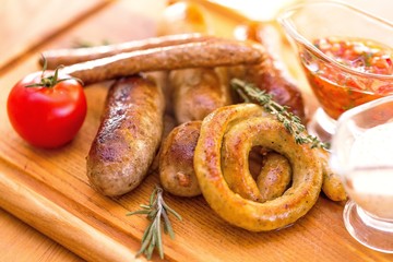 Meat on Cutting Board with Sauces