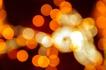 Texture from the blurred multicolored circles in bokeh style for design. Defocused lights of the city.