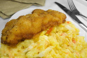 traditional salad with breaded meat