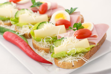 Fresh Canape with ham, cheese and egg