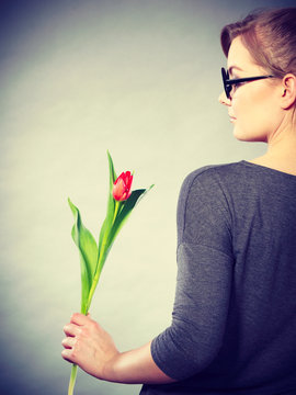 Elegant woman with flower.