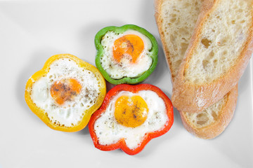 Colourful pepper with eggs and bread