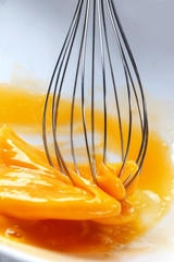 Whipping egg whisk. The concept of using eggs in the recipe Macro.