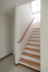 Interior of classic staircase with stairs in a house, home staircase with railing