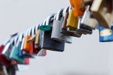 Fototapeta premium Lot of padlocks hanging on bridge. Concept represent forever love