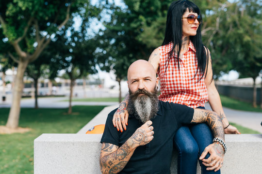 Mature hipster couple in park, portrait, Valencia, Spain
