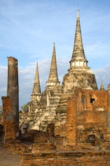 The ruins of the ancient Buddhist temple of Wat Phra Si Sanphet on a sunny morning. Ayutthaya, Thailand