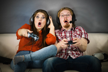 Gamer couple playing games