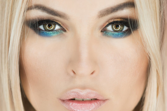Woman with eye color, makeup face, beauty