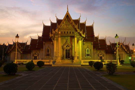 Evening twilight at the temple of Wat Benchamabophit (Marble Temple). Bangkok, Thailand