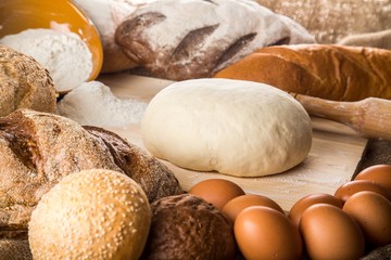 Bread Dough with Ingredients and Rolling Pin