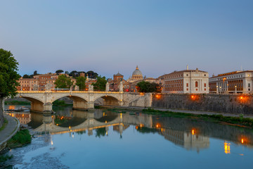 Obraz premium Rome. The Tiber River and Saint Peter's Cathedral.