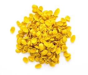 A delicious yellow cereal on a white background.