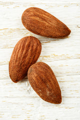 three almonds on white