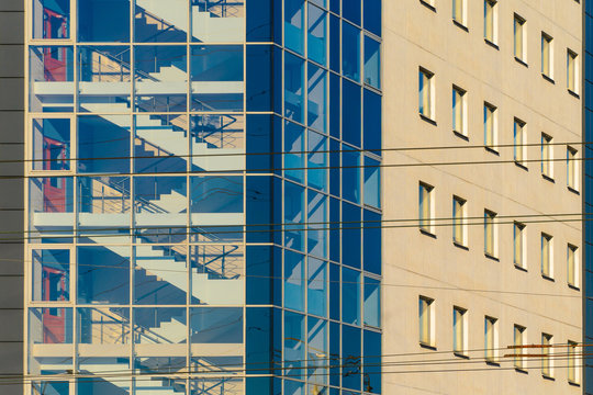 Stairwell Of An Office Building Behind A Glass Facade. Building Architecture Background