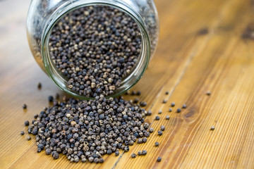 black pepper in the grain of the background