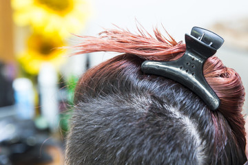 coloring hair in hair salon