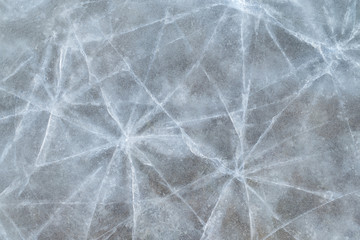 Cracked ice texture. Top view. Nature winter background.