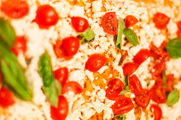  Traditional Italian Focaccia Pizza with tomatoes, black olives and cheese s texture.