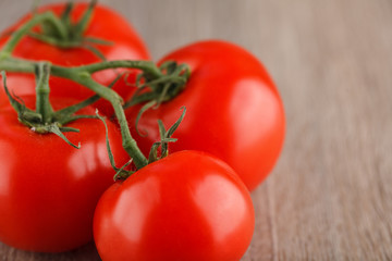 fresh red tomatoes with green stem